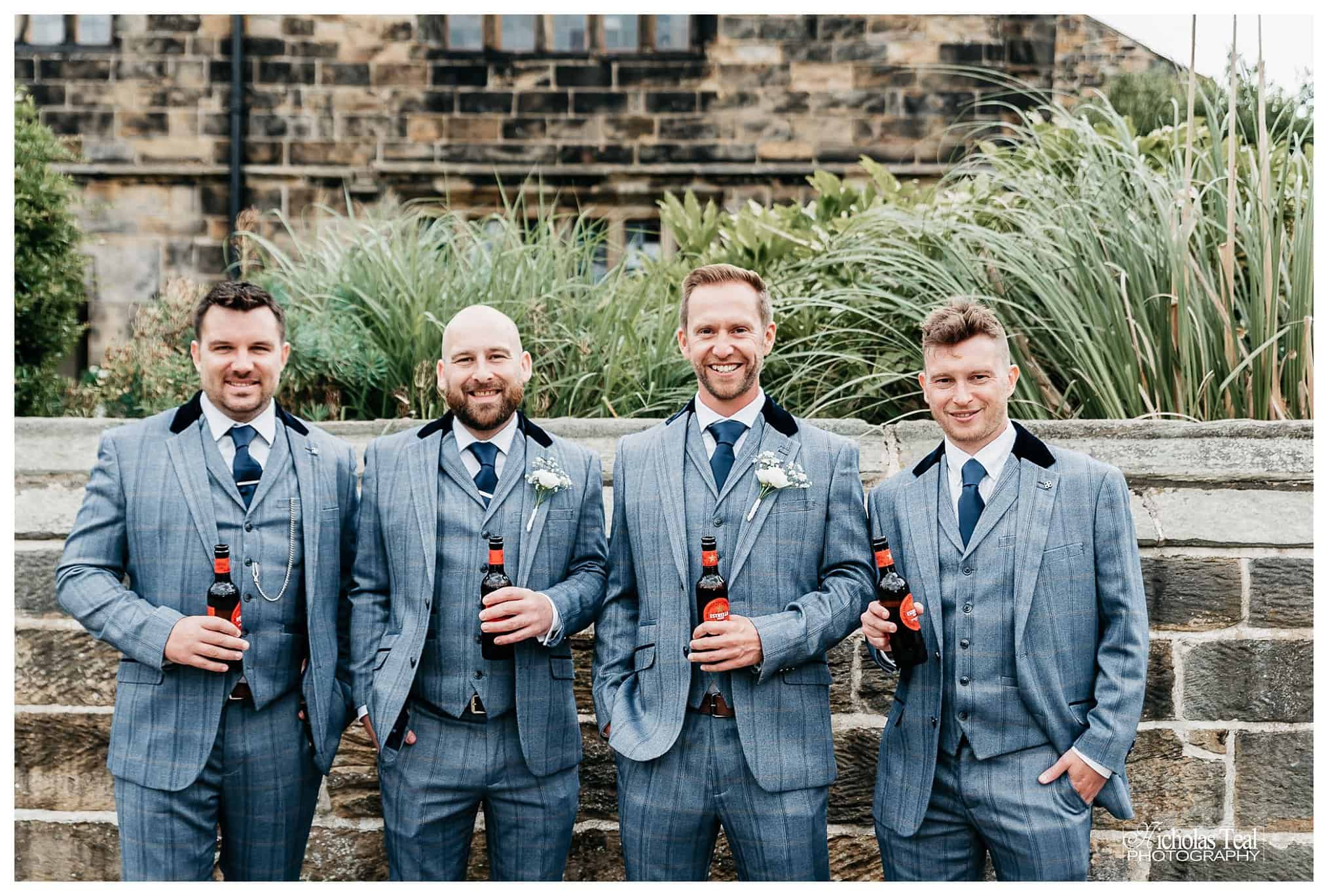 Groomes x 4 posing with beers in hand Oakwell Hall Batley , Oakwell hall Wedding Photos, Oakwell Hall Wedding Photographer