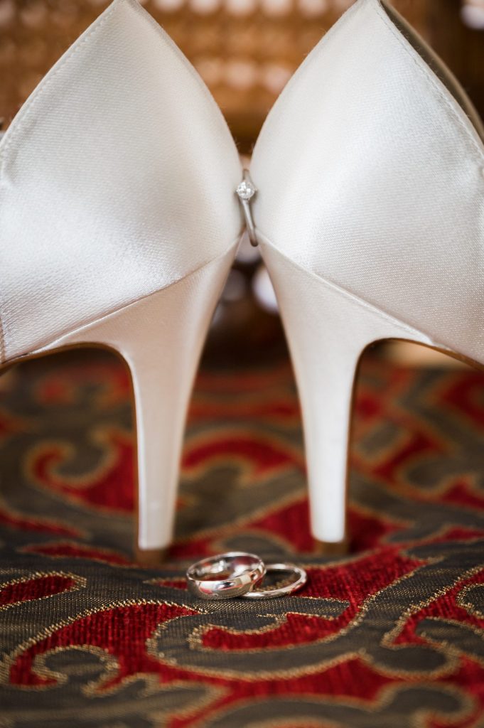 photograph of rings resting in brides shoe, Walworth Castle Hotel,Darlington ,Walworth Castle Hotel Photographer, Walworth Wedding Photos