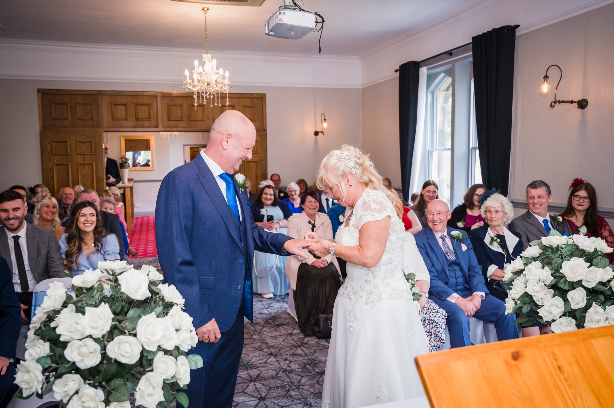 ring exchange images , Bride and Groom portraits - Holmfield Arms