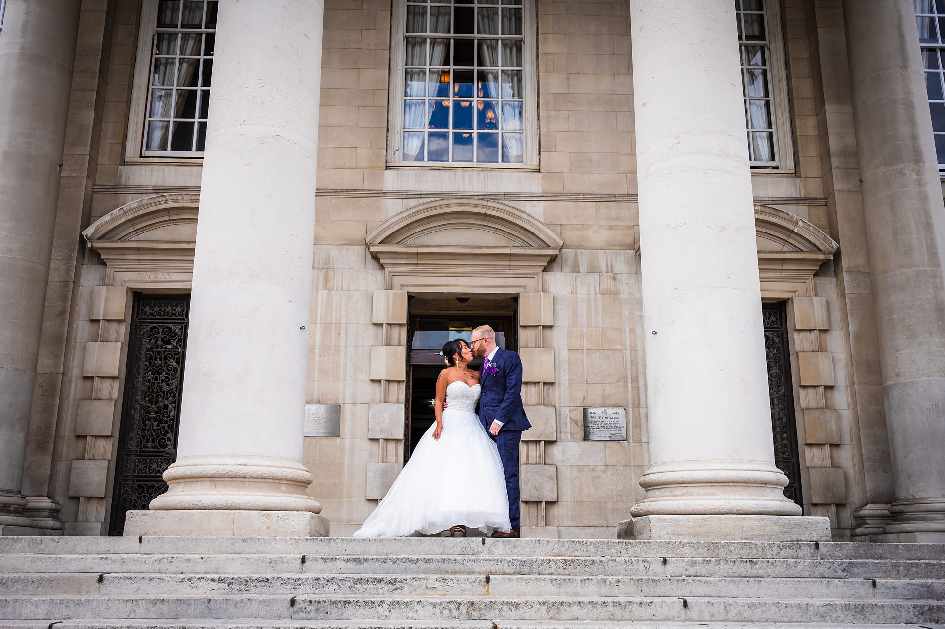 bride and groom on leeds civic hall steps, Leeds west Yorkshire