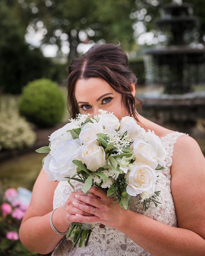 picture of the bride holding wedding flowers