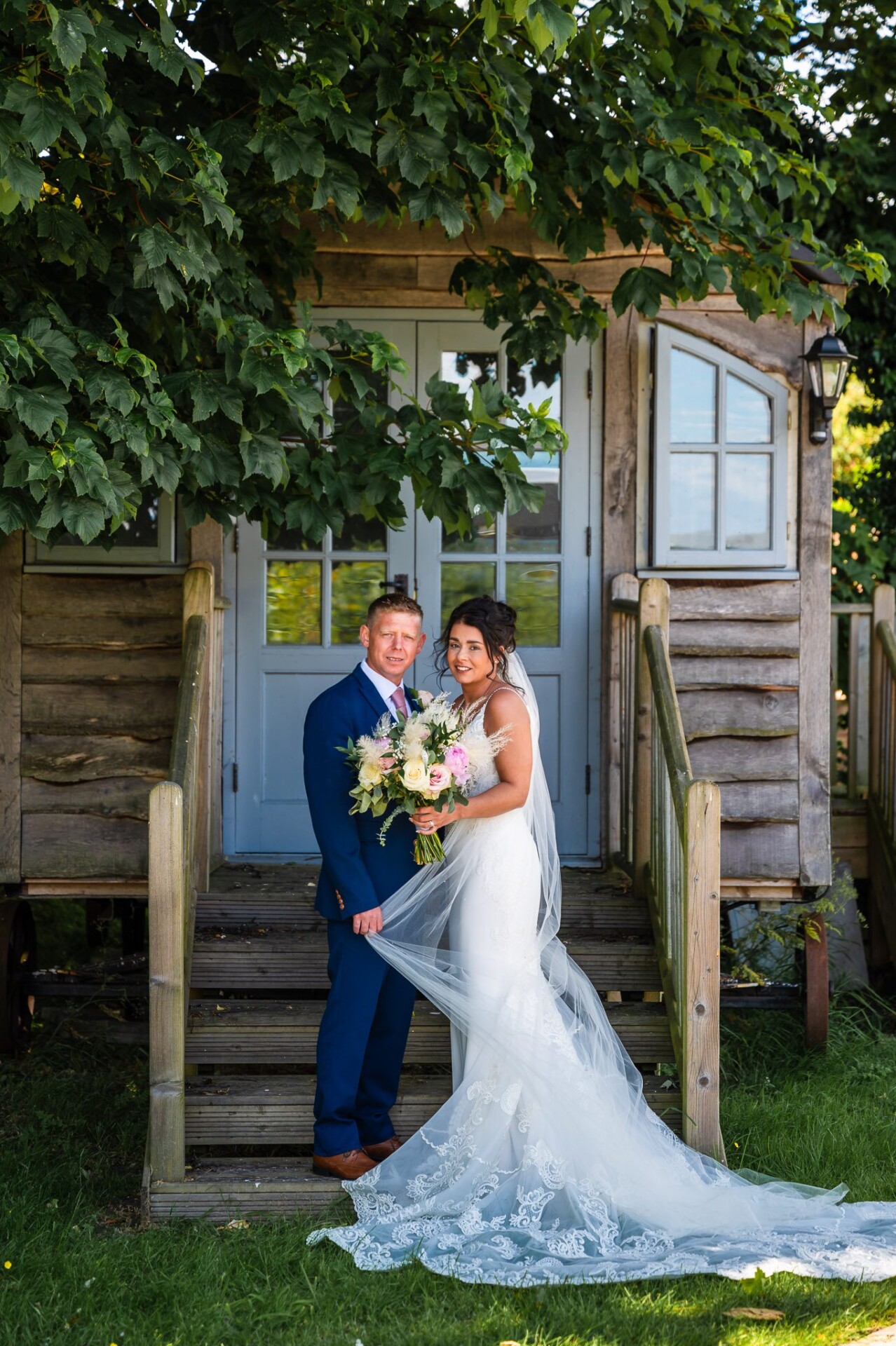Bride & groom on rustic steps, timeless, stylish wedding photography